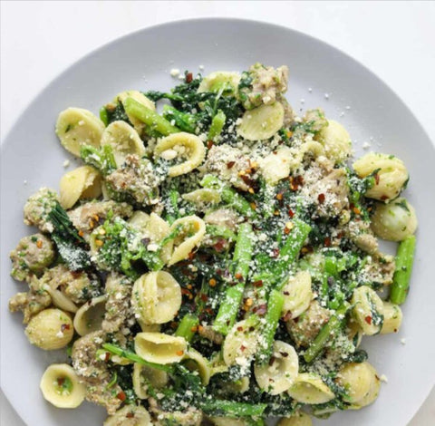 Orecchiette pasta with Italian sausage, broccoli rabe, Parmesan, and red pepper flakes