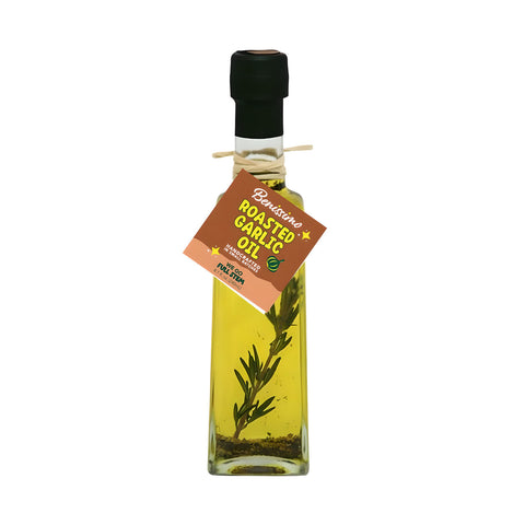 Bottle of roasted garlic oil with a label on a white background