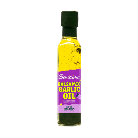 Bottle of Benissimo Balsamic Garlic Oil on a white background