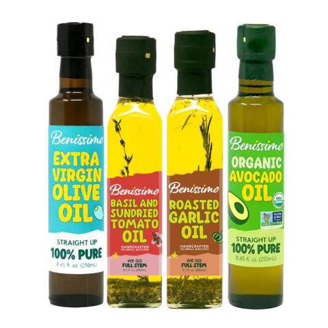 Four bottles of Benissimo oils with variety flavors and colorful labels on a white background