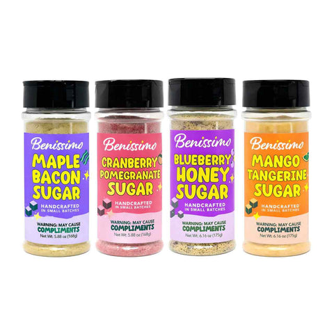 Four jars of Benissimo sugar with colorful labels on a white background
